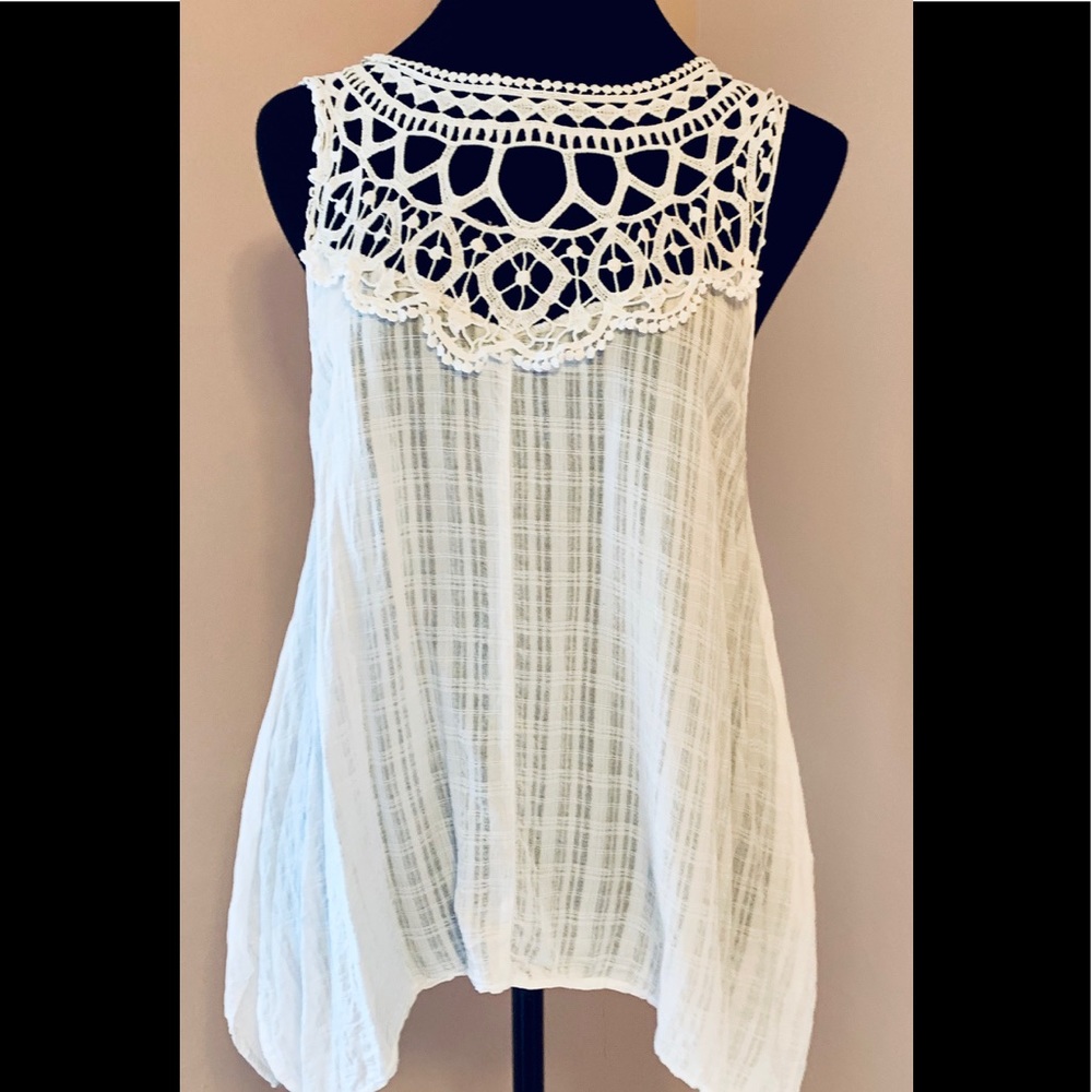 SOLD.   Lacey, gauzey top